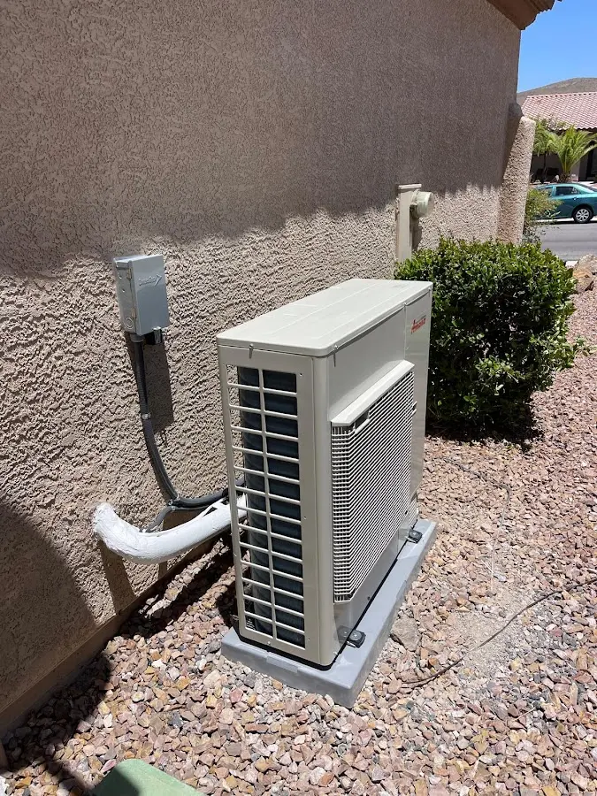 Residential air conditioning condenser unit in College Place